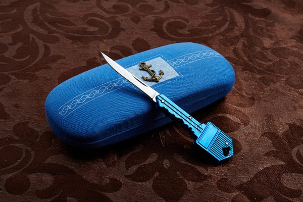 Porte clé muni d’un couteau canif de poche