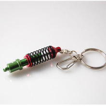 Porte Clé suspension ajustable de tuning coilover spring vert et rouge